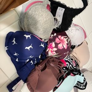 PINK (7) 32A bras and 1 small bralette.